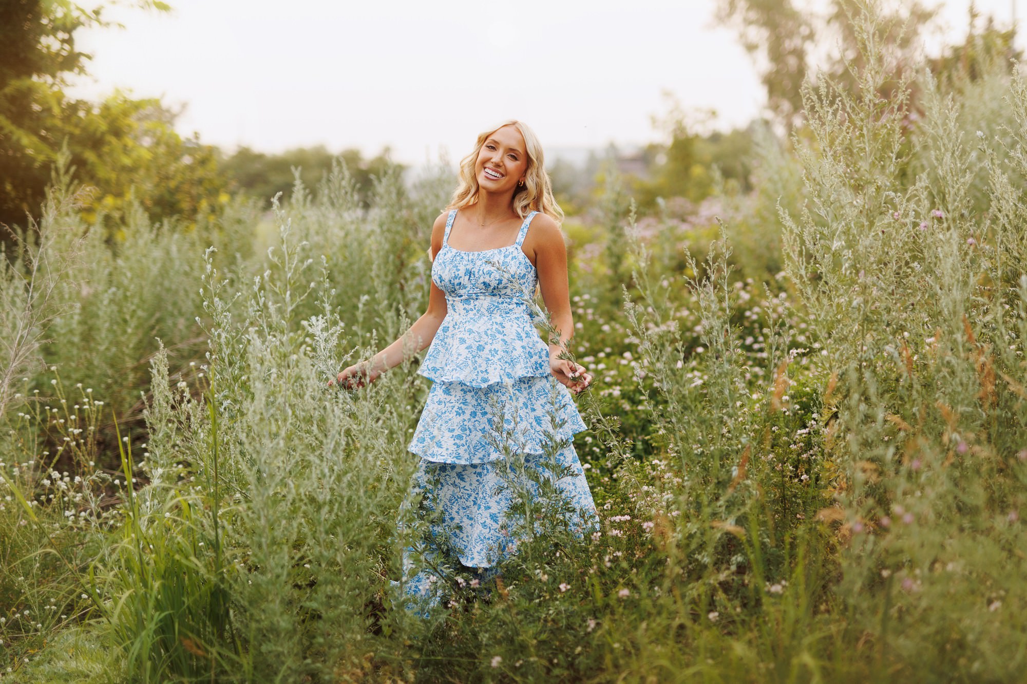 Minnesota senior photos featuring floral dress and natural setting